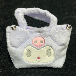 Sanrio Purple fuzzy 7x9” purse. New, no tags.